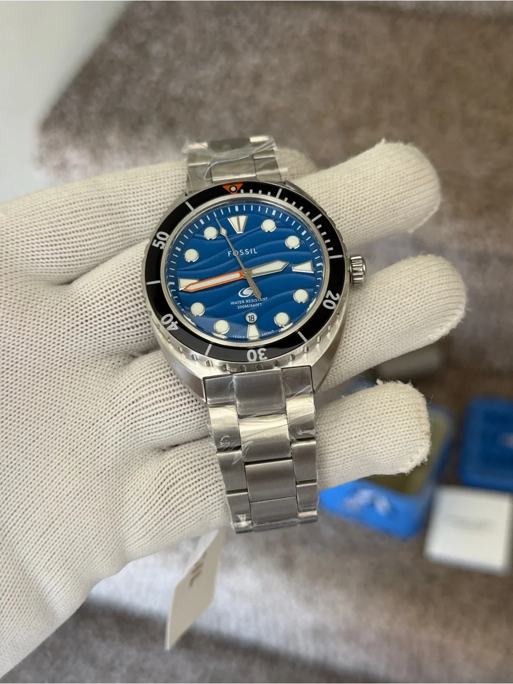 Fossil Men’s Blue Wave Dial Stainless Steel Swim Watch with Black Bezel